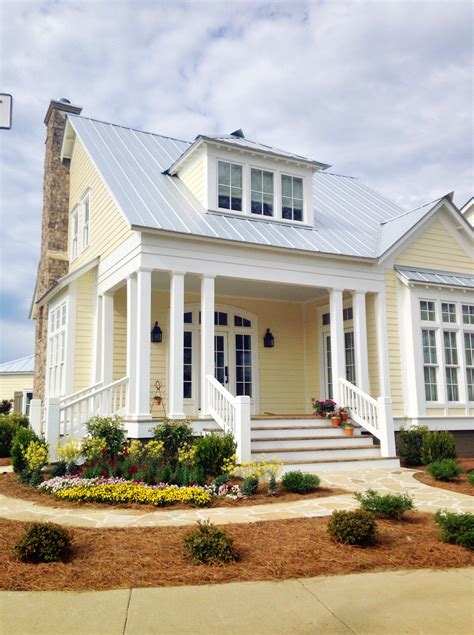 best color metal roof for a yellow house|houses with light colored shingles.